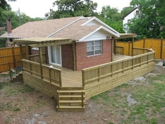 Deck Installations - Here at Sunset Fence, we have decades of combined experience when it comes to installing custom fences and creating other beautiful exterior additions. Serving Jacksonville, FL, we can create fences, decks, hardwood tables, and arbors you're sure to love. A local, family-owned business established in 1996, we stand behind all our work with a one-year craftsmanship warranty. Deck Installations - Here at Sunset Fence, we have decades of combined experience when it comes to installing custom fences and creating other beautiful exterior additions. Serving Jacksonville, FL, we can create fences, decks, hardwood tables, and arbors you're sure to love. A local, family-owned business established in 1996, we stand behind all our work with a one-year craftsmanship warranty.