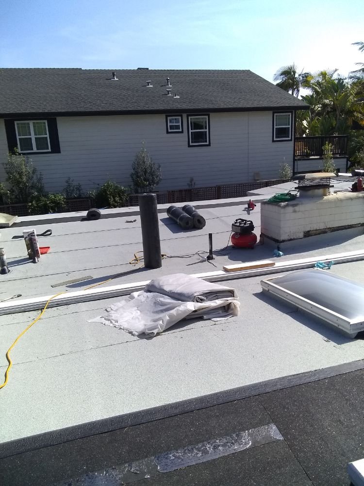 Slide of Tello's Roofing