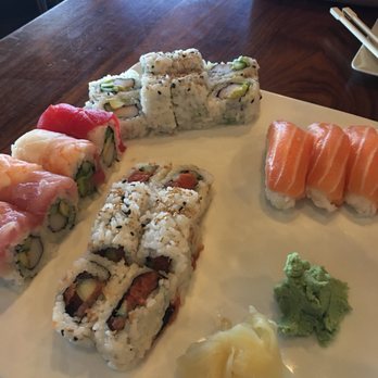 Squid Ink - From top left - California roll, salmon nigiri, spicy tuna roll, and rainbow roll - Sushi Bars Near Me - Peoria, Arizona