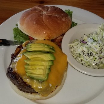 Pacific Kitchen at Nye Beach - Grass Fed Bourbon Burger with Asian poppy seed slaw. - Seafood Near Me - Newport, Oregon Pacific Kitchen at Nye Beach - Grass Fed Bourbon Burger with Asian poppy seed slaw. - Seafood Near Me - Newport, Oregon