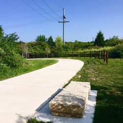 Route 152 Trail - Route 152 Trail, love big slab of stone function as resting bench by the trail. Cool idea, thanks KC Parks!!! 8/18/18