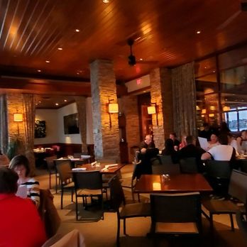 Seasons 52 - Patio dinning pre sunset. - New American Near Me - Orlando, Florida