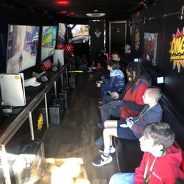 4 massive tvs with 4 different systems and a gaming chair all built inside. A gamers dream! 4 massive tvs with 4 different systems and a gaming chair all built inside. A gamers dream!