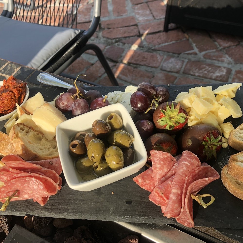 Pourr Decisions wine lounge - Charcuterie board - Wine Bars Near Me - Modesto, California Pourr Decisions wine lounge - Charcuterie board - Wine Bars Near Me - Modesto, California