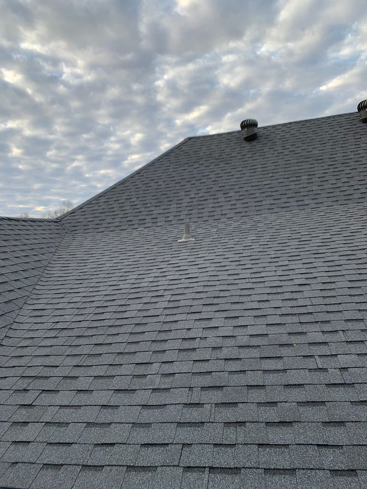 Slide of Pelican Roofing Company