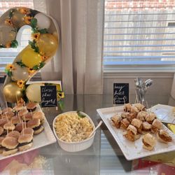 Buttered Up Catering - Entree platter displays. (To be clear they provided Food, platters and signage- no decor!)