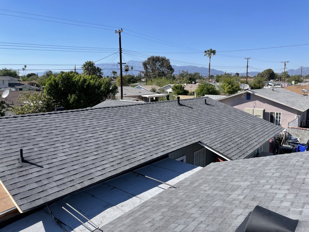 Slide of CM Roofing