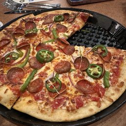 Pepperoni with added jalapeños. Pepperoni with added jalapeños.