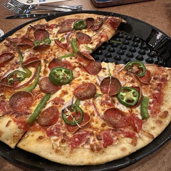 Squatters Pub - Pepperoni with added jalapeños. - Brewpubs Near Me - West Valley City, Utah Squatters Pub - Pepperoni with added jalapeños. - Brewpubs Near Me - West Valley City, Utah