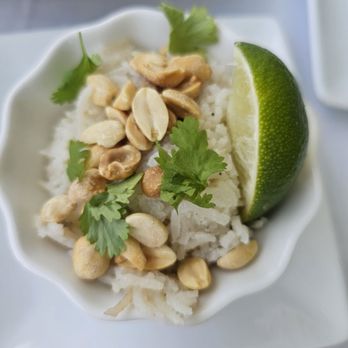 Louie's Backyard - Coconut rice, peanuts, and cilantro. - New American Near Me - Key West, Florida