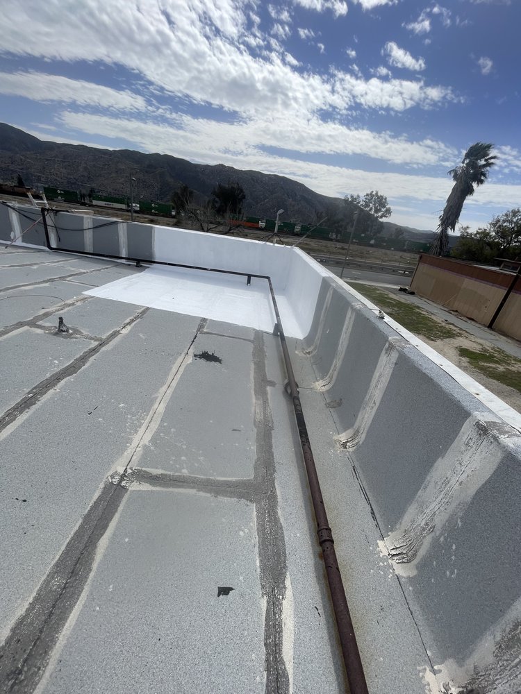 Slide of A Town Roofing