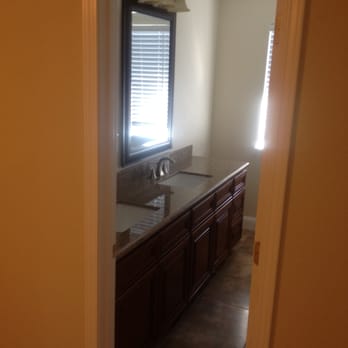 Avila's Construction - a bathroom with a sink and a window - General Contractors Near Me - San Jose, California