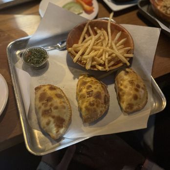 La Masa Empanada Bar - Wisco Corn Empanada, tomato basil mozz empanada, Mushroom Truffle Parmesan Empanada, Thin N Crispy Fries - Empanadas Near Me - Milwaukee, Wisconsin La Masa Empanada Bar - Wisco Corn Empanada, tomato basil mozz empanada, Mushroom Truffle Parmesan Empanada, Thin N Crispy Fries - Empanadas Near Me - Milwaukee, Wisconsin