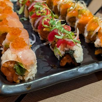 Shimogamo - Chandler - Slightly angled shot L: Zen Roll M: Yuzu Tuna Roll R: Double Salmon - Sushi Bars Near Me - Chandler, Arizona Shimogamo - Chandler - Slightly angled shot L: Zen Roll M: Yuzu Tuna Roll R: Double Salmon - Sushi Bars Near Me - Chandler, Arizona