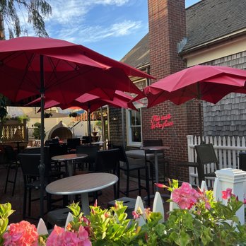 Shipwreck Lounge - tables and umbrellas outside - Wine Bars Near Me - Provincetown, Massachusetts Shipwreck Lounge - tables and umbrellas outside - Wine Bars Near Me - Provincetown, Massachusetts