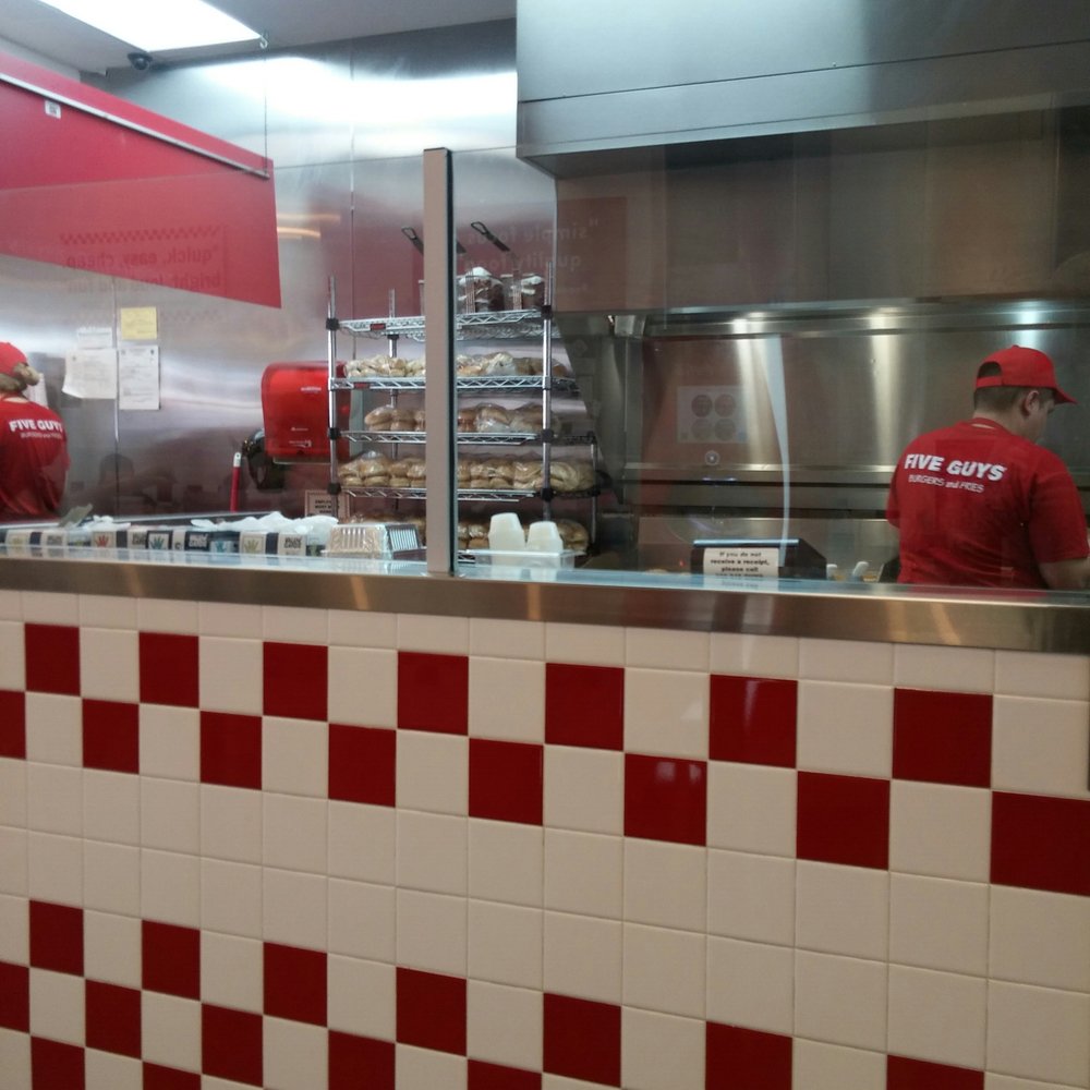 Five Guys - The kiitchen - cooks move too fast to photograph! - Burgers Near Me - Worcester, Massachusetts Five Guys - The kiitchen - cooks move too fast to photograph! - Burgers Near Me - Worcester, Massachusetts