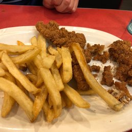 a plate of fried chicken and french fries