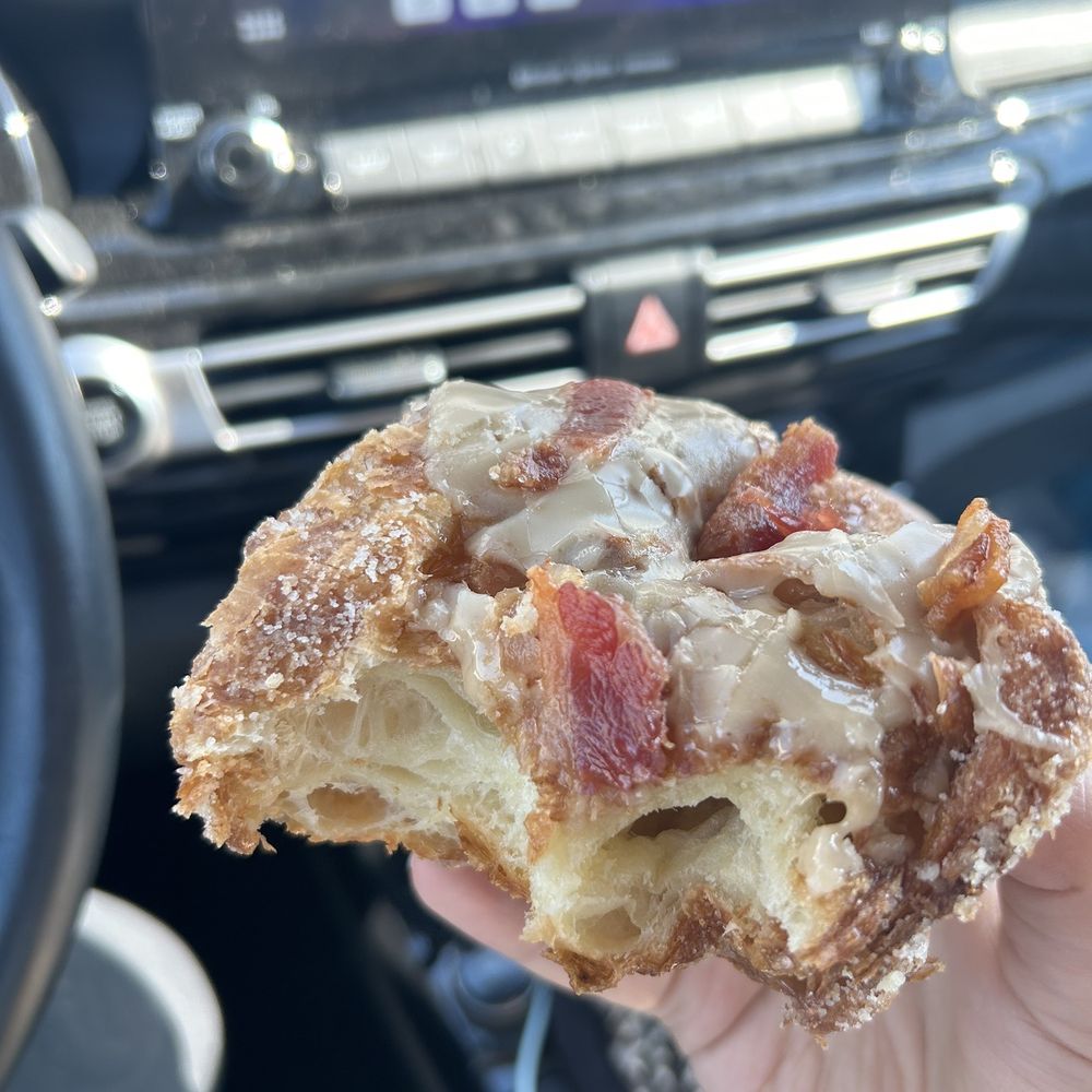 Maple bacon light, airy delicious. You do not want to eat these driving down the road tho. The toppings can be a bit messy.