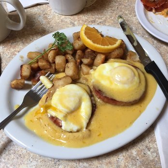 The Coffee Cup Cafe - Eggs Benedict with a side of breakfast potatoes. - American Near Me - Long Beach, California