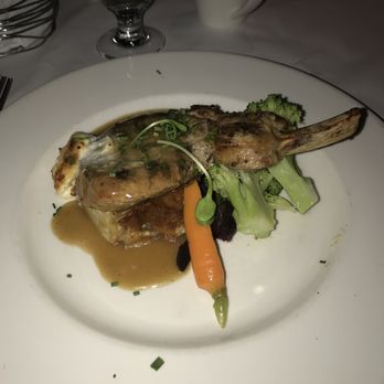 Bistro 1640 - Pork chop with a potato square, garden vegetables and gravy - French Near Me - Quebec City, Quebec Bistro 1640 - Pork chop with a potato square, garden vegetables and gravy - French Near Me - Quebec City, Quebec