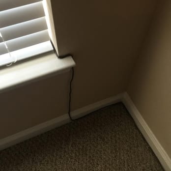 Marquis Carmel Commons - AC unit power cable run across wall (fire code violation) - Apartments Near Me - Charlotte, North Carolina Marquis Carmel Commons - AC unit power cable run across wall (fire code violation) - Apartments Near Me - Charlotte, North Carolina