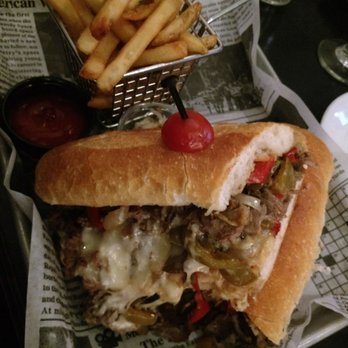The Trestle - Sliced steak sandwich - Cocktail Bars Near Me - Astoria, New York The Trestle - Sliced steak sandwich - Cocktail Bars Near Me - Astoria, New York