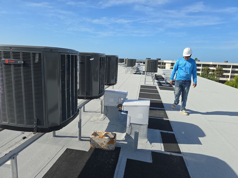 Slide of Rigos Roofing Installers