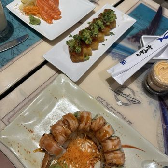 Papa's Raw Bar - Salmon Sashimi Crispy Rice Cakes Firecracker Roll - Seafood Near Me - Lighthouse Point, Florida Papa's Raw Bar - Salmon Sashimi Crispy Rice Cakes Firecracker Roll - Seafood Near Me - Lighthouse Point, Florida
