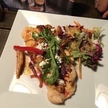 Hüsi Bierhaus - Flatbread with grilled chicken, feta and a side salad - International Near Me - Interlaken, BE Hüsi Bierhaus - Flatbread with grilled chicken, feta and a side salad - International Near Me - Interlaken, BE
