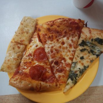 Cicis Pizza - three slices of pizza on a yellow plate - Pizza Near Me - Saint Petersburg, Florida
