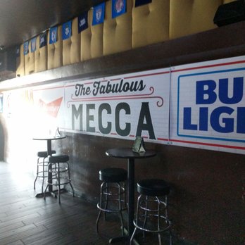 Mecca - a bar with tables and stools - Nightlife Near Me - Santa Barbara, California Mecca - a bar with tables and stools - Nightlife Near Me - Santa Barbara, California