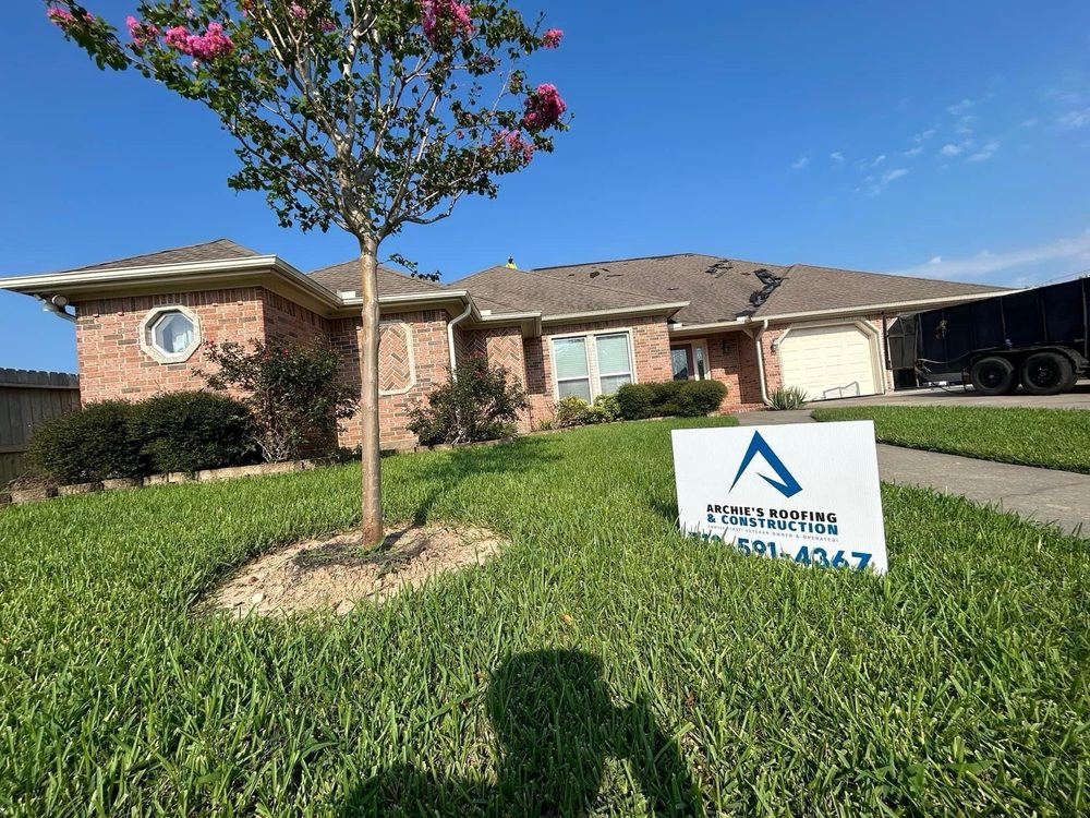 Slide of Archie's Roofing & Construction
