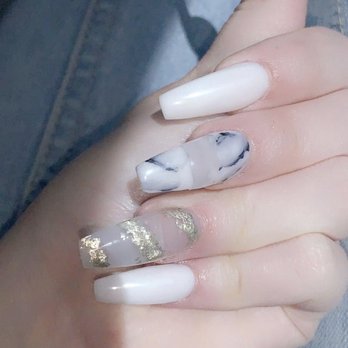 VIP Nails - white coffin nails with marble and gold flake designs - Nail Salons Near Me - Beaumont, Texas