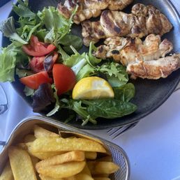 Chicken with salad and fries