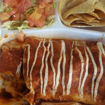 Tacos la Estrella - Mold on tomatoes for a wet lengua burrito - Tacos Near Me - Palmdale, California