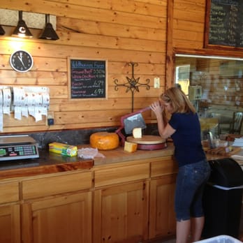 Velhuizen Cheese - a woman at a counter - Specialty Food Near Me - Dublin, Texas Velhuizen Cheese - a woman at a counter - Specialty Food Near Me - Dublin, Texas