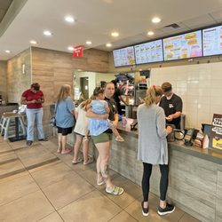 Burger King - Customers patiently waiting for delayed pick-up orders.