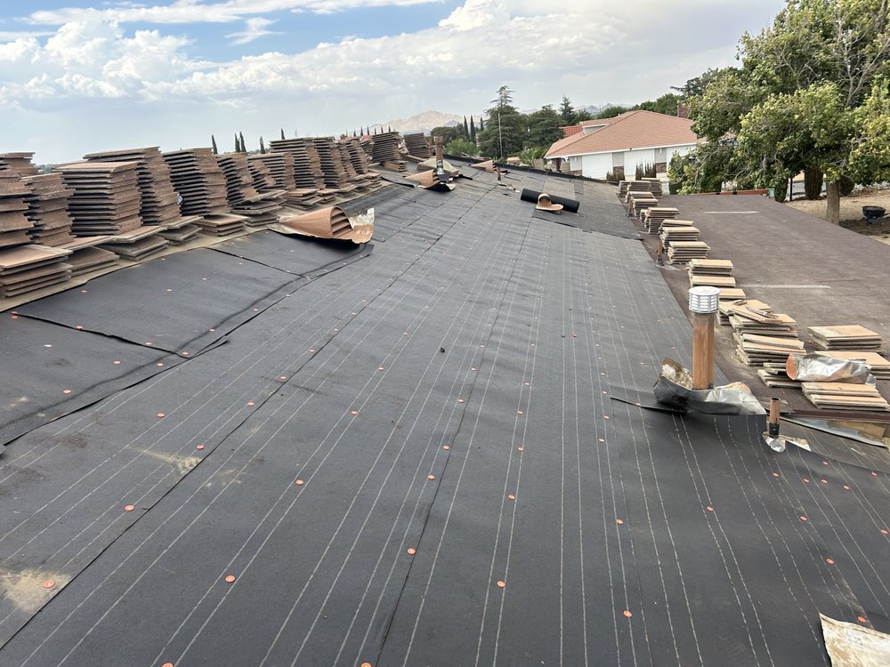 Slide of Defender Roofing 