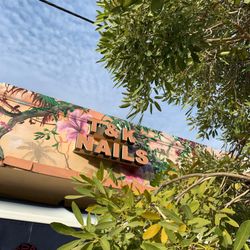 T & K Nails - The sign is super cute and there is beautiful mural on the building!