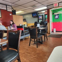 a woman sitting at a table a woman sitting at a table