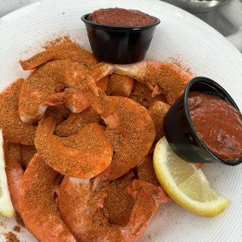 Mango's - Cold Boiled Shrimp, smothered in Old Bay, with cocktail sauce. - Caribbean Near Me - Bethany Beach, Delaware Mango's - Cold Boiled Shrimp, smothered in Old Bay, with cocktail sauce. - Caribbean Near Me - Bethany Beach, Delaware