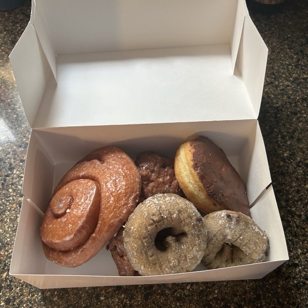 Donut House - Our donut Wednesday score...2 blueberry, 2 apple fritters, a cinnamon roll and a custard filled chocolate. - Donuts Near Me - Saint Louis, Missouri Donut House - Our donut Wednesday score...2 blueberry, 2 apple fritters, a cinnamon roll and a custard filled chocolate. - Donuts Near Me - Saint Louis, Missouri