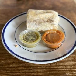 Taqueria Luna - 1/2 of a large breakfast burrito and salsas.