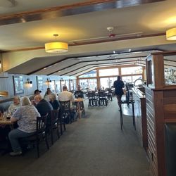 The largely empty restaurant with the manager complaining how busy the place was