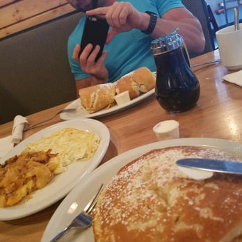 Brownstone Pancake Factory - Coconut pancakes and my fiance had the pancake with sausage, egg and cheddar inside. With a side of protein lol - Breakfast & Brunch Near Me - Edgewater, New Jersey