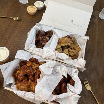 bb.q Chicken OKC Northside - Top right is the cheesy ones, and bottom left is the secret flavor. - Chicken Wings Near Me - Oklahoma City, Oklahoma