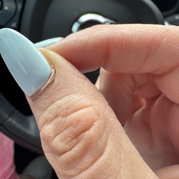 Monaco Nails & Spa - Glue seeped out at the cuticles as well - Nail Salons Near Me - Brookshire, Texas