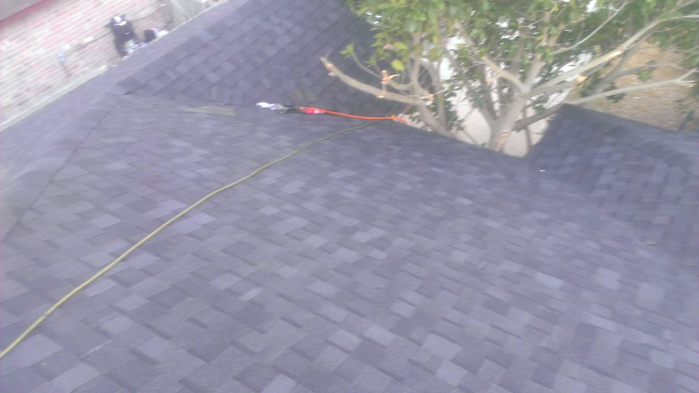 Slide of Martinez Roofing