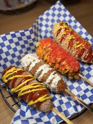 Two Hands Corn Dogs by null