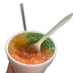 Small snow cone; kiwi, mango, passion fruit